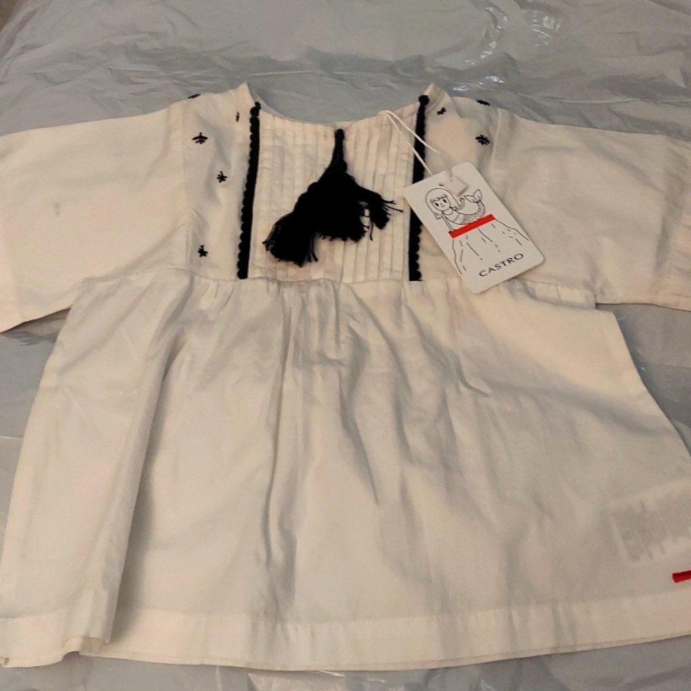 Castro white and black shirt